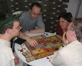 Eine Spielrunde bei der Spiel'05 in Essen spielt ''Das Ende des Triumvirats'' (Anklicken zum Vergrößern)